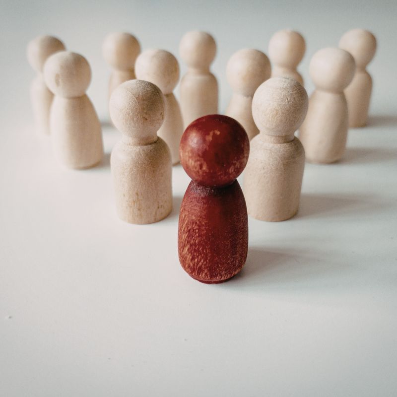 Senior leader reviewing team performance and supporting line manager development